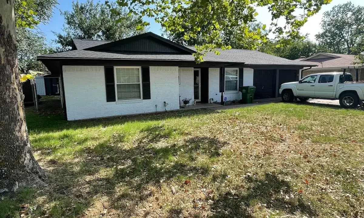 Professional roofing crew working on a residential roof in Silverthorne